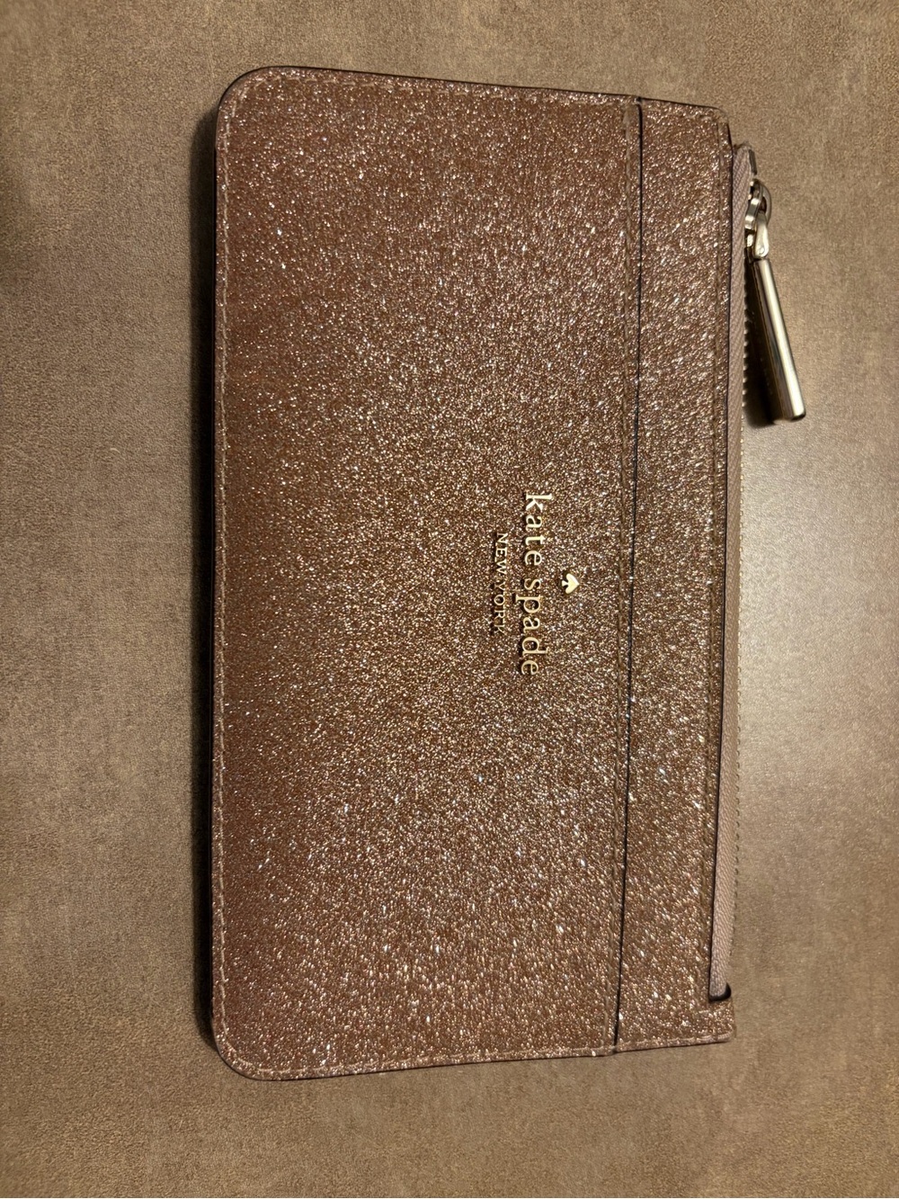kate spade pink glitter zip-around wallet